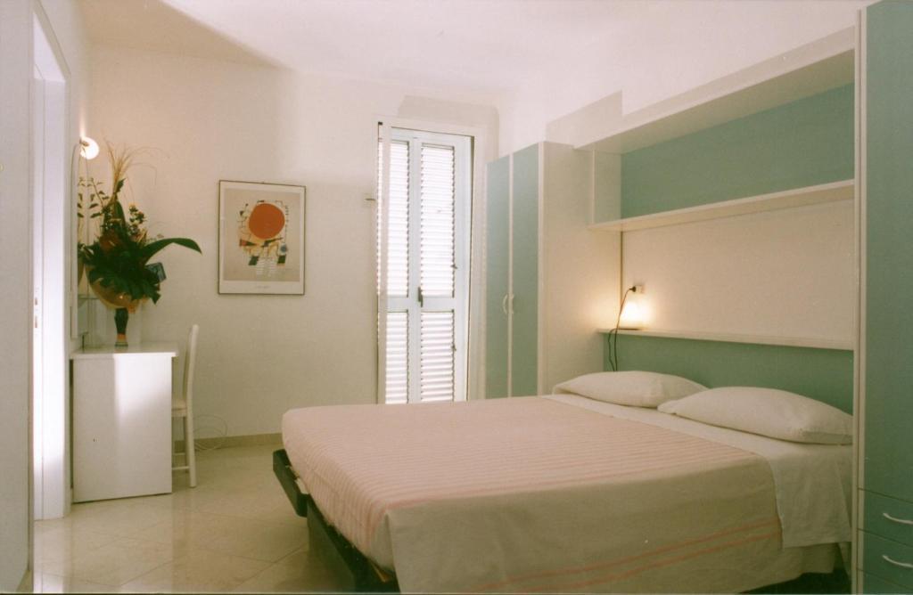 Hotel Cosmopolita Ріміні Номер фото